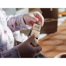 Load image into Gallery viewer, mindful spindle held by child displaying we are free