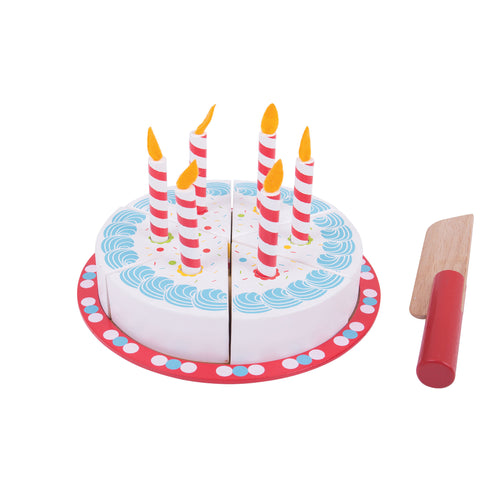 colourful wooden toy cake with six candles and wooden slicer