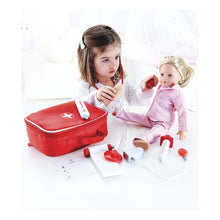 Load image into Gallery viewer, child playing with doll and doctor play set
