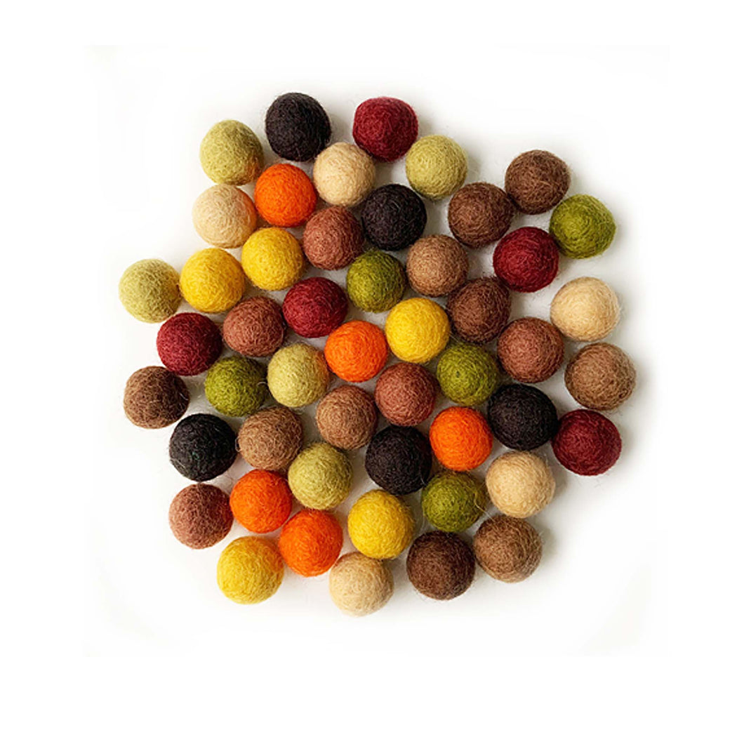 set of 50 felt balls in natural colours
