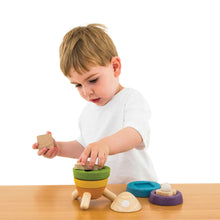 Load image into Gallery viewer, boy playing with plan toys multi coloured stacking rocket
