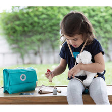 Load image into Gallery viewer, child playing with Plan Toys Vet Set
